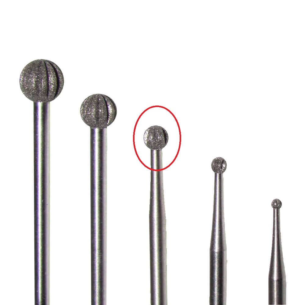 Five spherical-tipped diamond burr tools are lined up vertically. The second from the right, a Dentech DIAMOND BUR ROUND 3.1MM CA, is circled in red. Each tool has a metallic shaft and textured head.