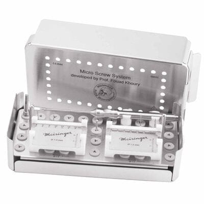 The Meisinger Khouri Micro Bone Screw System is a stainless steel dental micro screw kit designed for cortical bone graft fixation and bone augmentation procedures, featuring labeled slots for screws and tools, and an open lid displaying the organized contents inside.