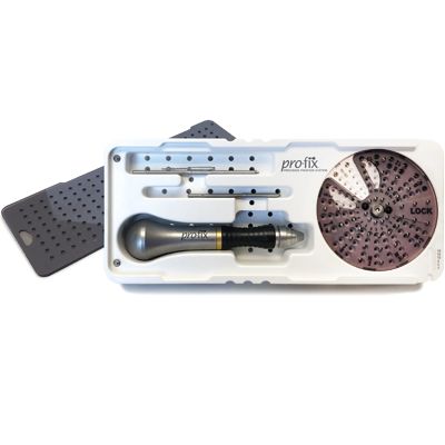 The Osteogenics Pro-Fix Bone Fixation Intro Kit features a white tray with handle, perforated plate, metal rods for graft stabilization, and a black perforated cover beside the tray.