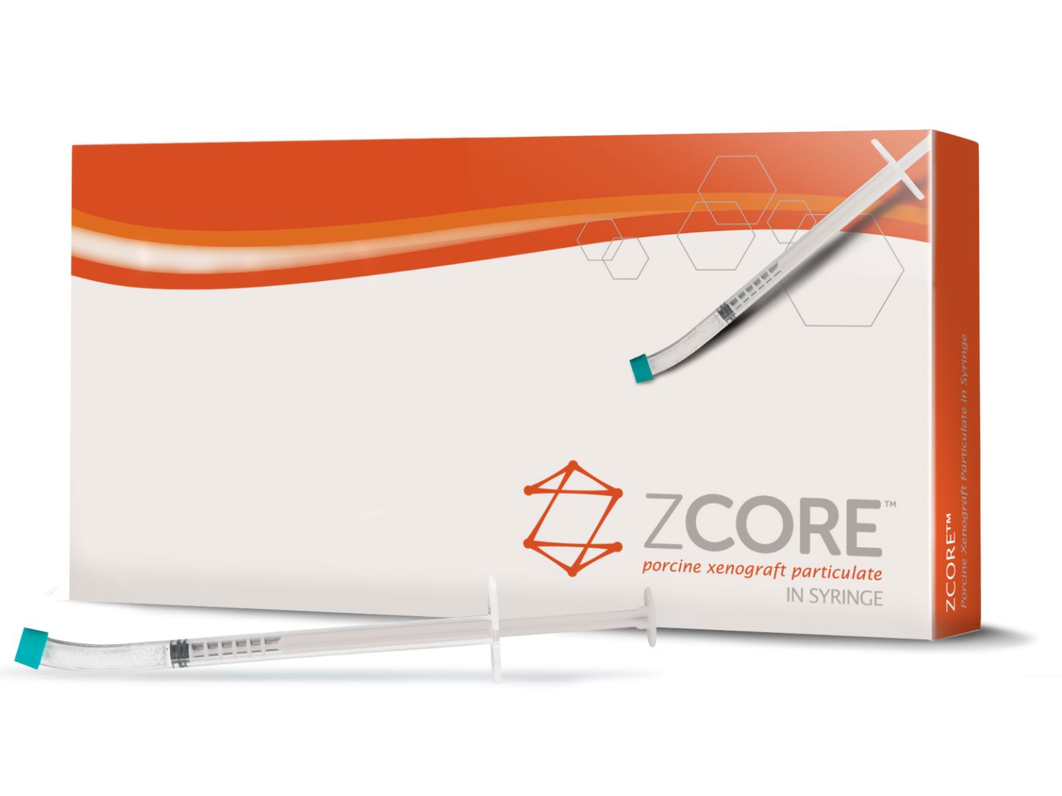 A white and orange Osteogenics Zcore™ Porcine Xenograft Particulate box is shown with two clear syringes in front—one flat, one angled—making it ideal for bone regeneration procedures.