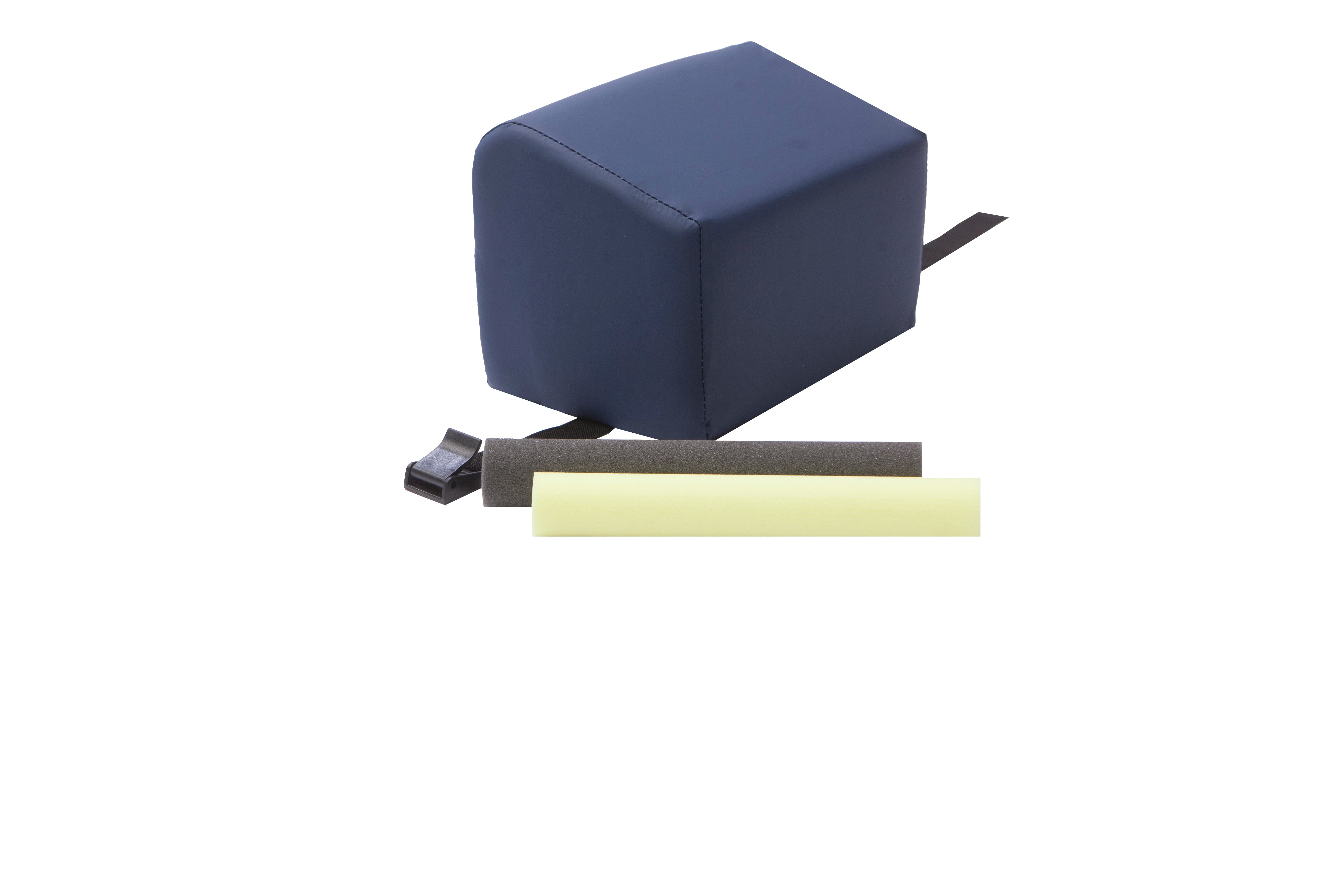 The Mediposture 6" iCore Geriatric Memory Headrest, a navy blue rectangular memory foam headrest with strap, sits next to black and yellow cylindrical foam pieces on white background for improved dental patient comfort.