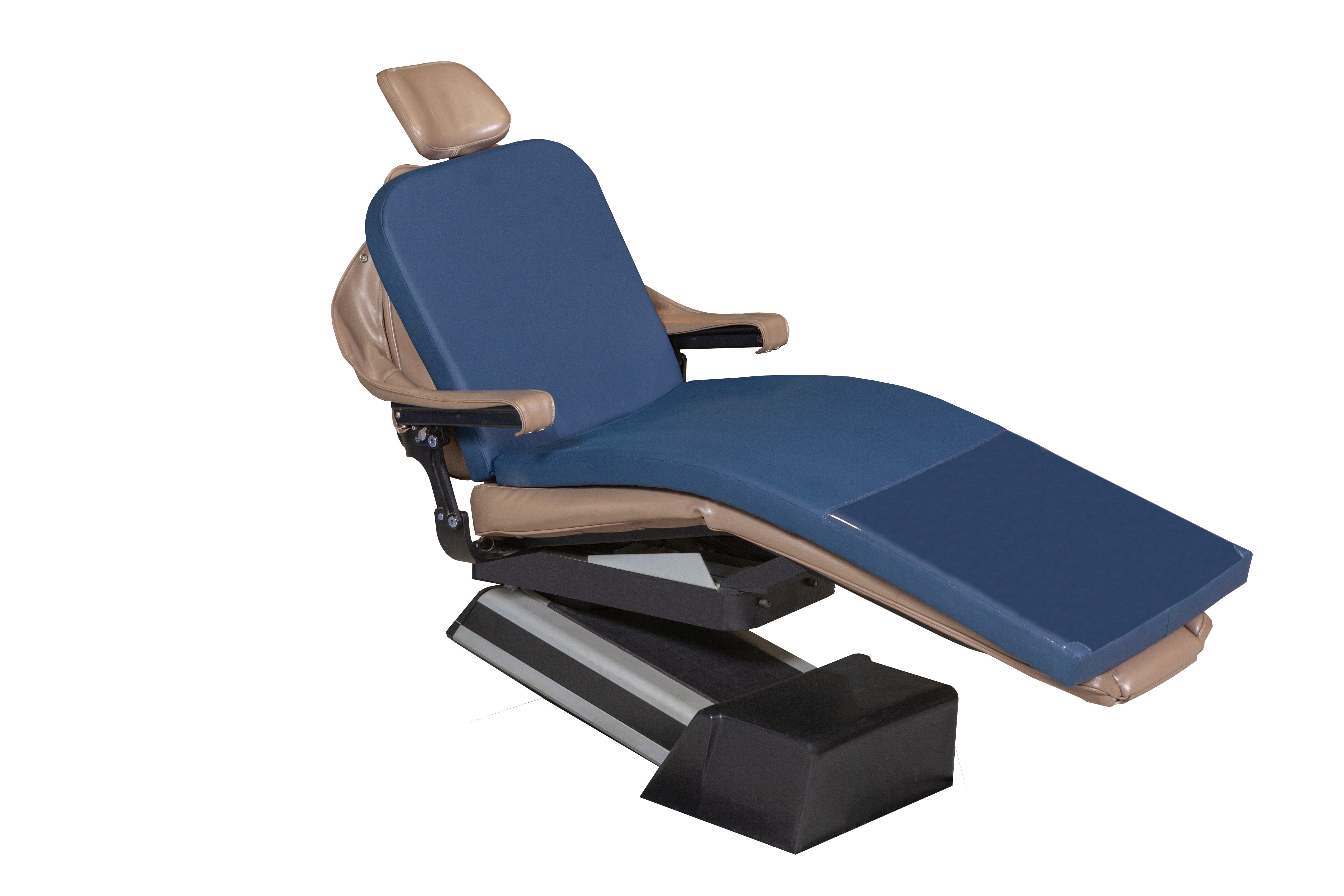 The Mediposture Memory Overlay Pad is a full-length memory foam dental chair cushion from Mediposture, shown on a blue and beige reclining dental chair with adjustable headrest and armrests, set on a black and silver base, isolated on white.