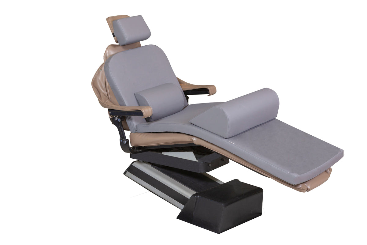The Mediposture Dental Chair Overlay System with 3.5" iCore Memory Headrest by Mediposture features gray and beige upholstery, adjustable armrests, headrest, footrest, and a memory foam overlay for patient comfort; shown on a modern reclining dental chair.