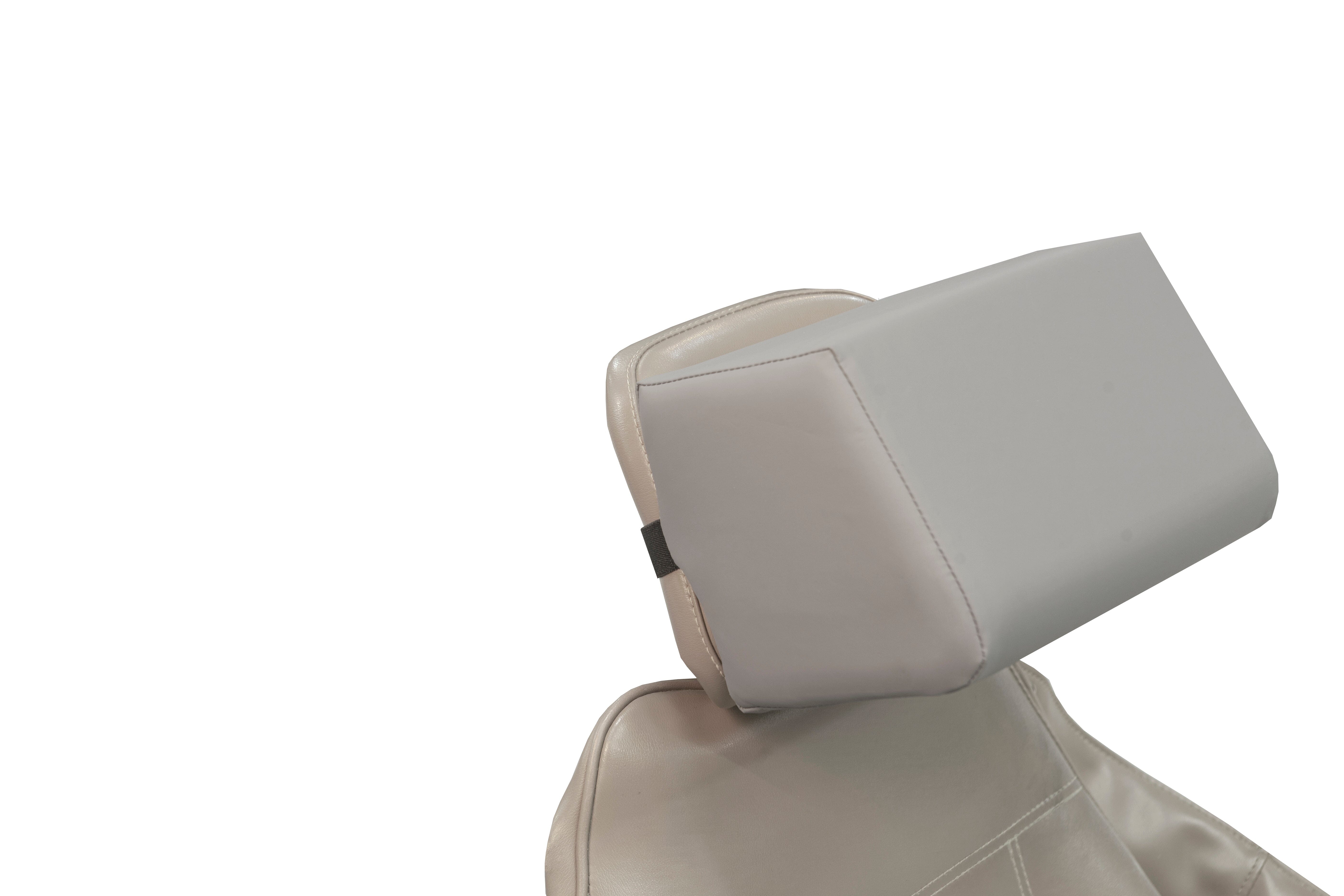 A close-up of a car seat featuring the Mediposture 6" iCore Geriatric Memory Headrest, a large, rectangular gray memory foam cushion, set against a plain white background.