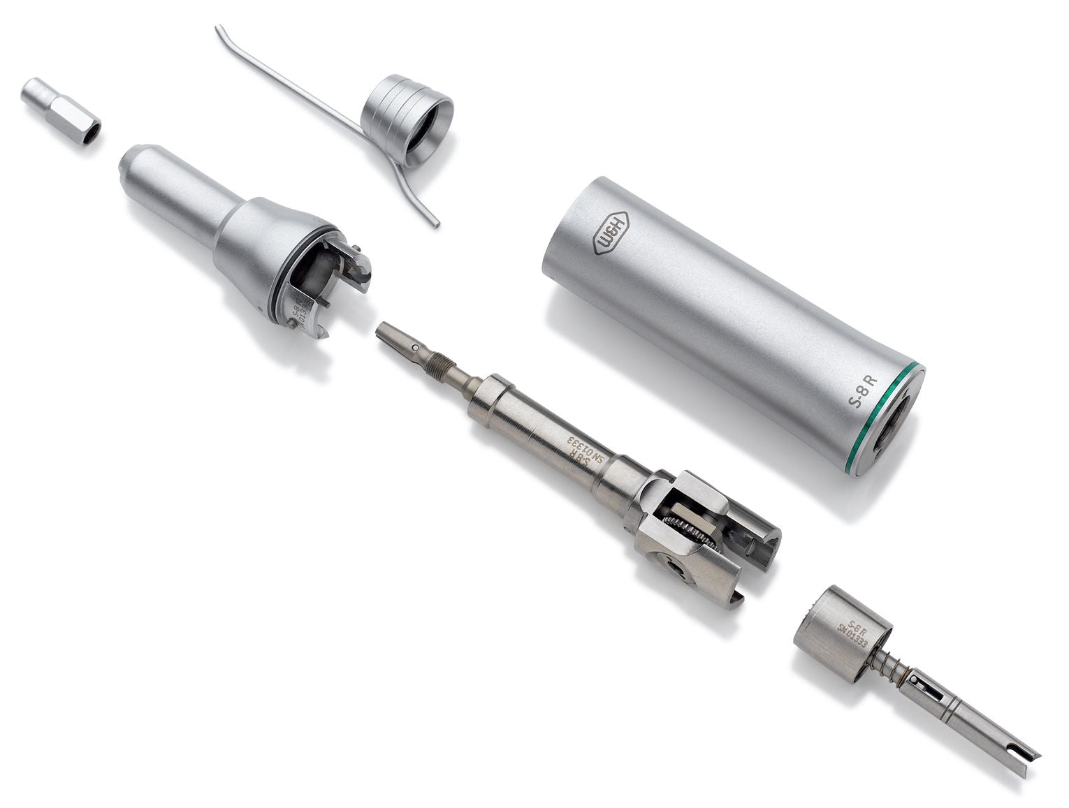 The W&H S-8R Reciprocating Saw Handpiece is shown disassembled, revealing its attachments, metal casing, and internal mechanisms—features designed for controlled bone cutting in cranio-maxillo-facial surgery.