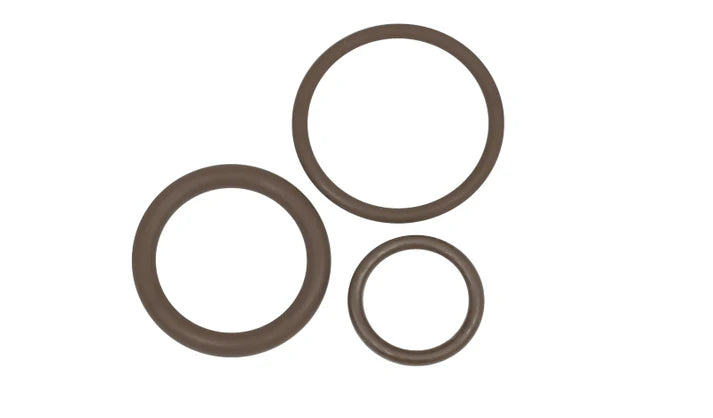 Three brown rubber O-rings from Quality Aspirators’ Replacement O-Ring Sets for Suction Valves & Traps are arranged on a white background—perfect as replacements or for autoclave use.