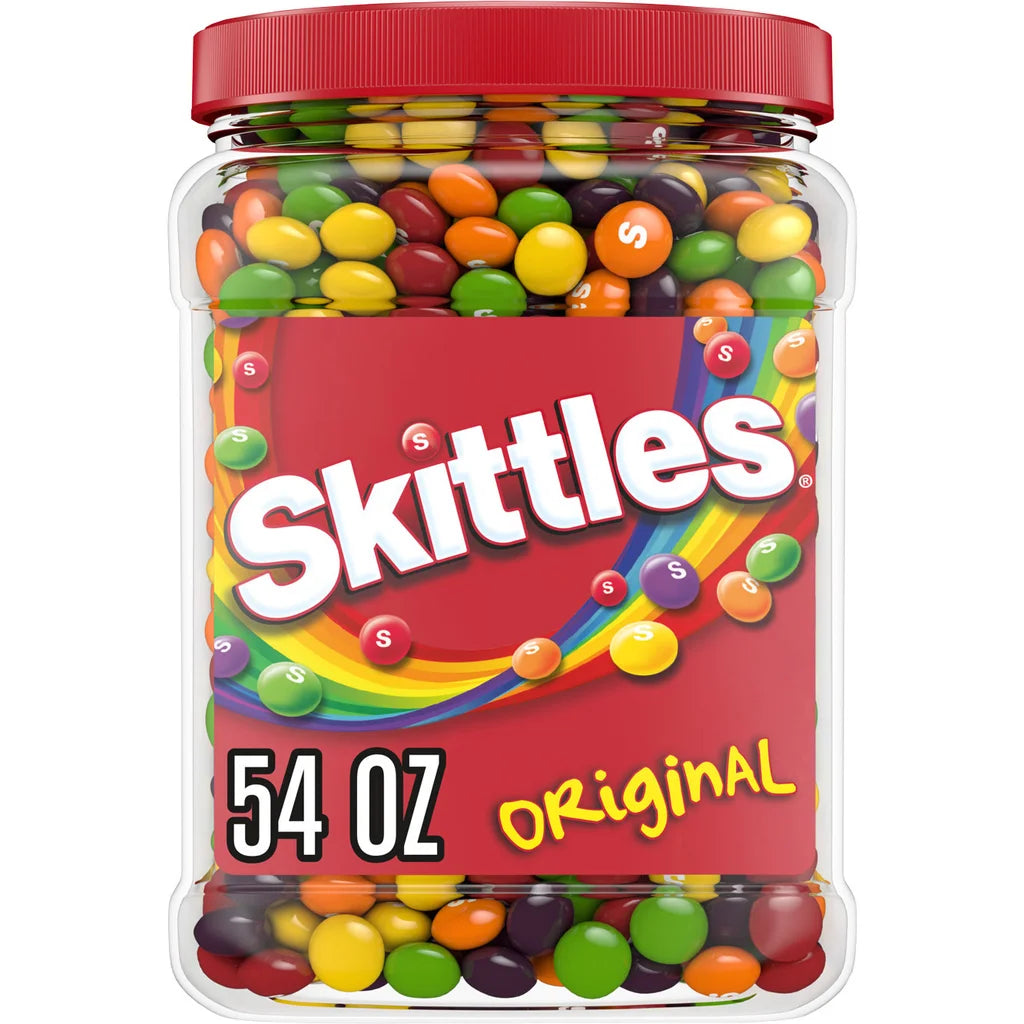 A large clear jar with a red lid, filled with colorful candies from Xemax Surgical Products. The label reads "Treat the Team — Candy Selection," 54 oz, making it a perfect team-sized sweet assortment.