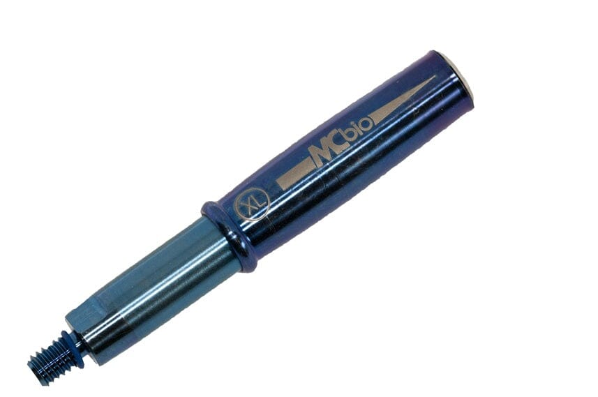 A metallic blue cylindrical tool labeled McBio Straight Tank & Blade Refill - STS Bone Collector, with a threaded end, serves as a titanium bone harvesting assembly, ideal for autogenous bone collector use, isolated on a white background.