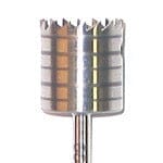 Close-up of a Dentech Bone Trephine drill bit by Dentech, featuring a cylindrical metal body with toothed, jagged edge and horizontal grooves, used in implant surgery for drilling circular holes.