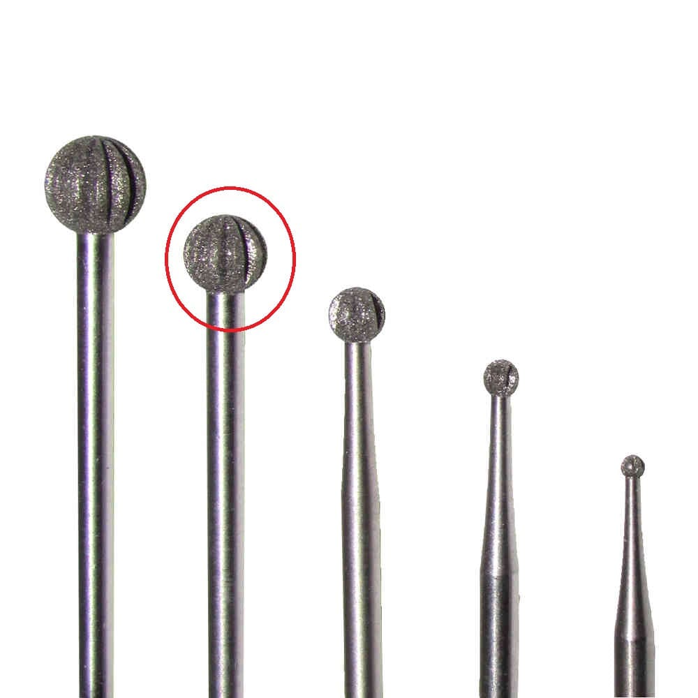 Five round metal ball-shaped burrs in increasing size from right to left; the DIAMOND BUR ROUND 4.8MM RIPPL by Dentech, second largest from the left, is circled in red.