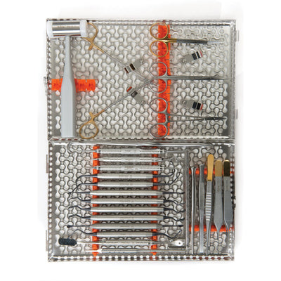 The Hu-Friedy Buser Implant and Membrane Surgery Kit features a neatly organized set of dental instruments in a perforated metal case with orange holders, designed specifically for implant dentistry procedures.