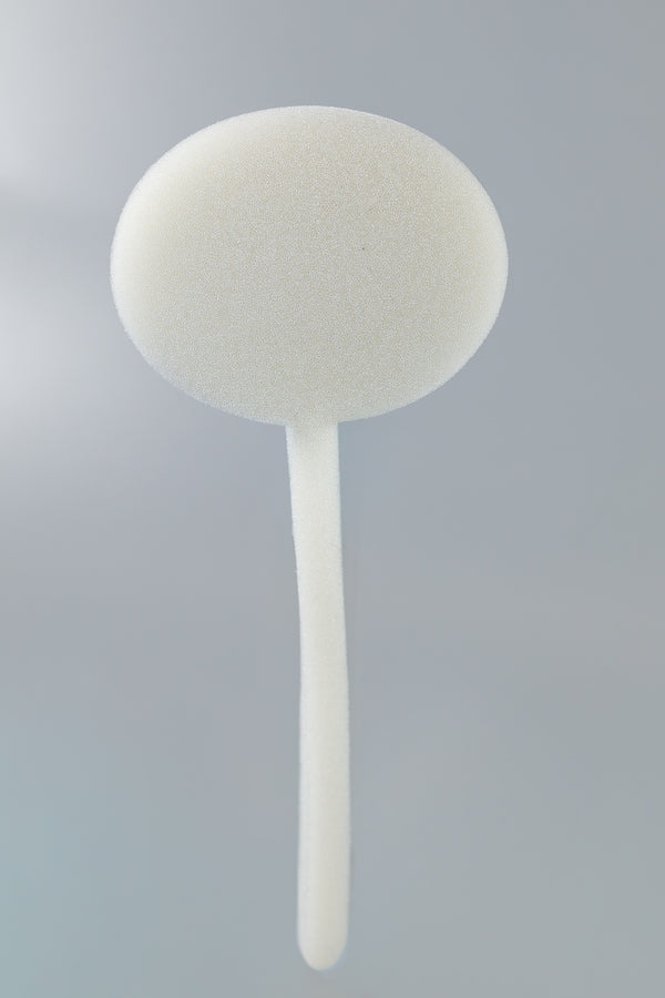 The Xemax C-Sponge III Surgical Throat Pack with a long retrieval tail is shown against a plain light gray background; this polyurethane foam applicator is supplied in a bag of 100.