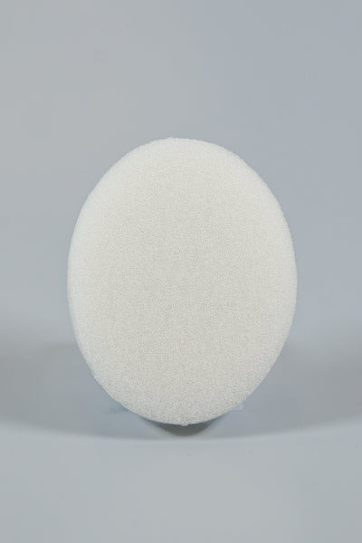 The Xemax C-Sponge Pedo, a reduced-size, white, textured pediatric surgical throat pack (bag of 50), is centered against a plain light gray background.