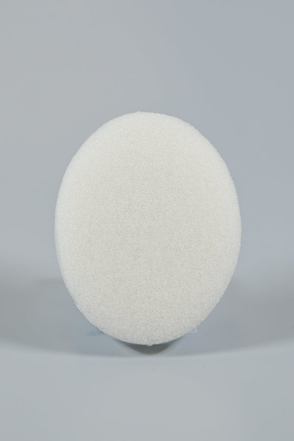 The Xemax C-Sponge Pedo, a reduced-size, white, textured pediatric surgical throat pack (bag of 50), is centered against a plain light gray background.