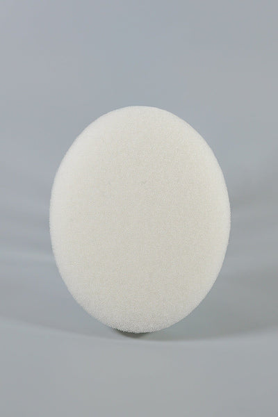 A round, white C-Sponge Regular Polyurethane Surgical Throat Pack by Xemax stands upright against a plain, light grey background.
