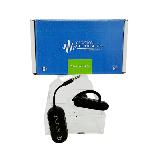 A blue and white Sedation Stethoscope box labeled "Enhancement Package – Bluetooth Upgrade" stands behind a black Bluetooth earpiece with buttons, displayed on a clear stand for seamless wireless monitoring.