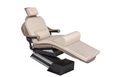 The Mediposture Dental Chair Overlay System with 3.5" Classic Memory Headrest by Mediposture is shown on a beige reclining medical chair with adjustable headrest, armrests, and leg support, enhancing patient comfort against a plain white background.