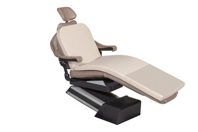 The Mediposture Memory Overlay Pad is a full-length memory foam dental chair cushion by Mediposture, shown on a beige and brown reclining chair with adjustable headrest and armrests, supported by a black base on a white background.