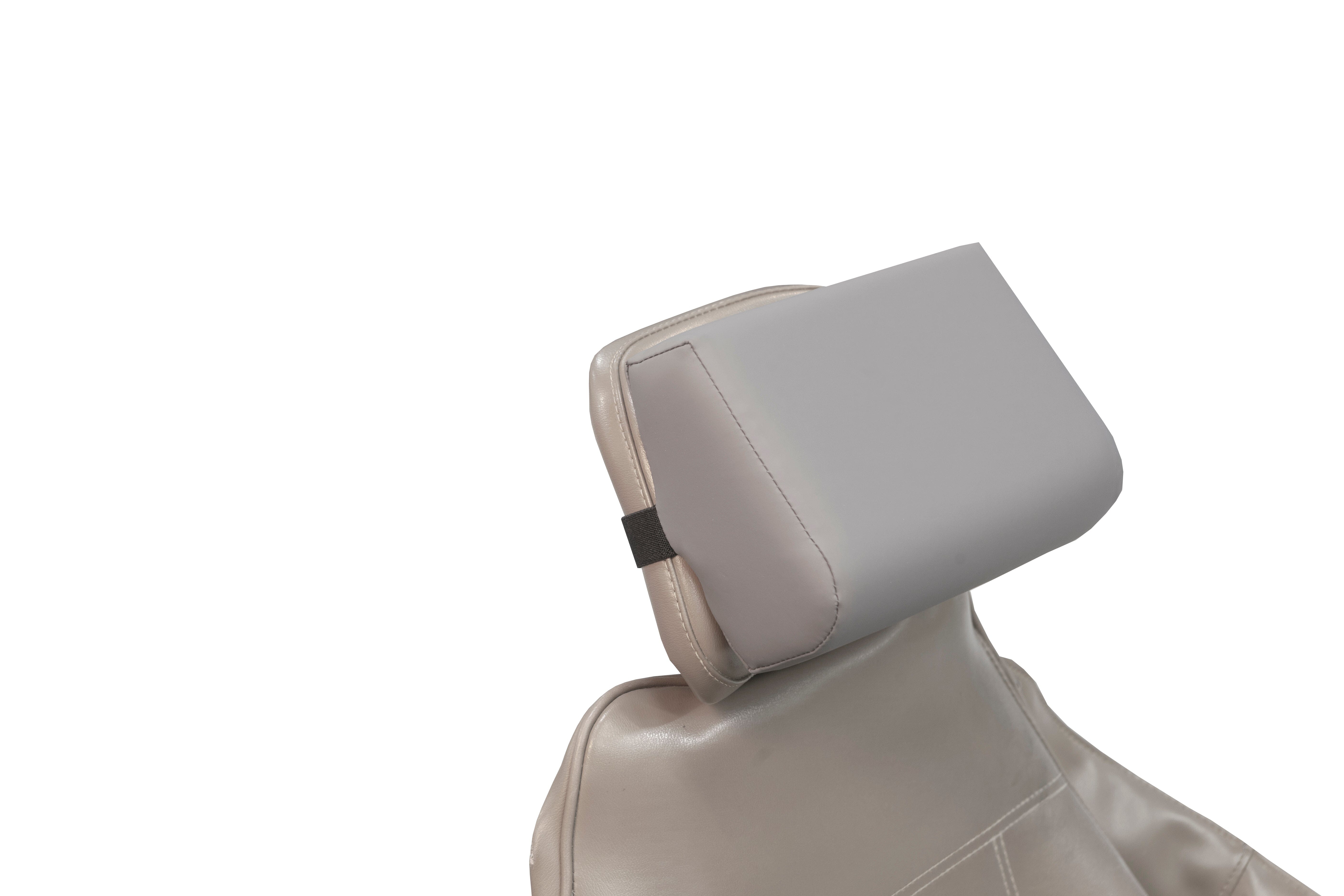 A close-up of a gray leather car seat with the Mediposture 3.5" Classic Memory Headrest by Mediposture attached, shown against a white background.