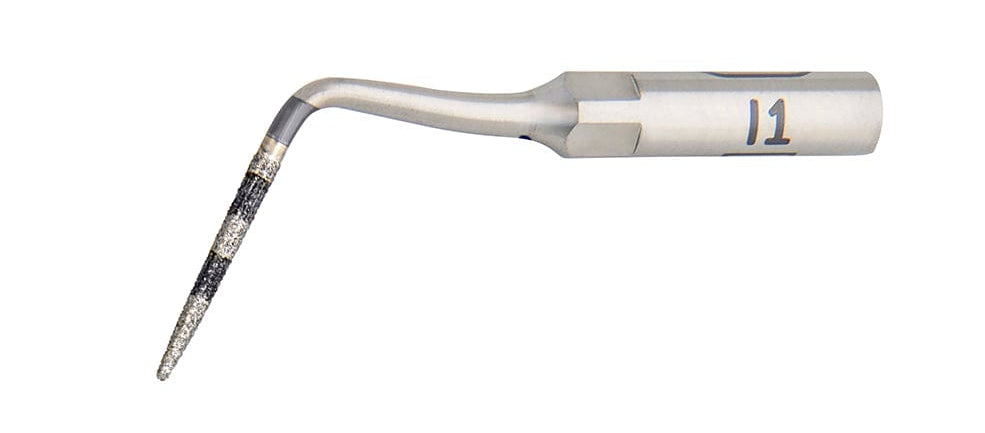 A close-up of the W&H Instrument I1 for Piezomed shows its curved, pointed, textured metal tip and the number 11 near the base, indicating its use in precise dental procedures.