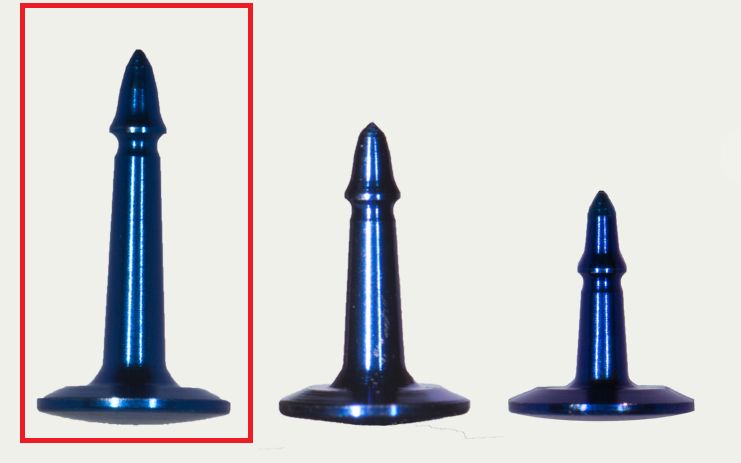 Three blue titanium SuperTack Fixation Tacks (3mm, 4mm, 5mm) by McBio are displayed side by side on a white background; the tallest tack on the left is highlighted with a red rectangle, similar to those used in GBR procedures.