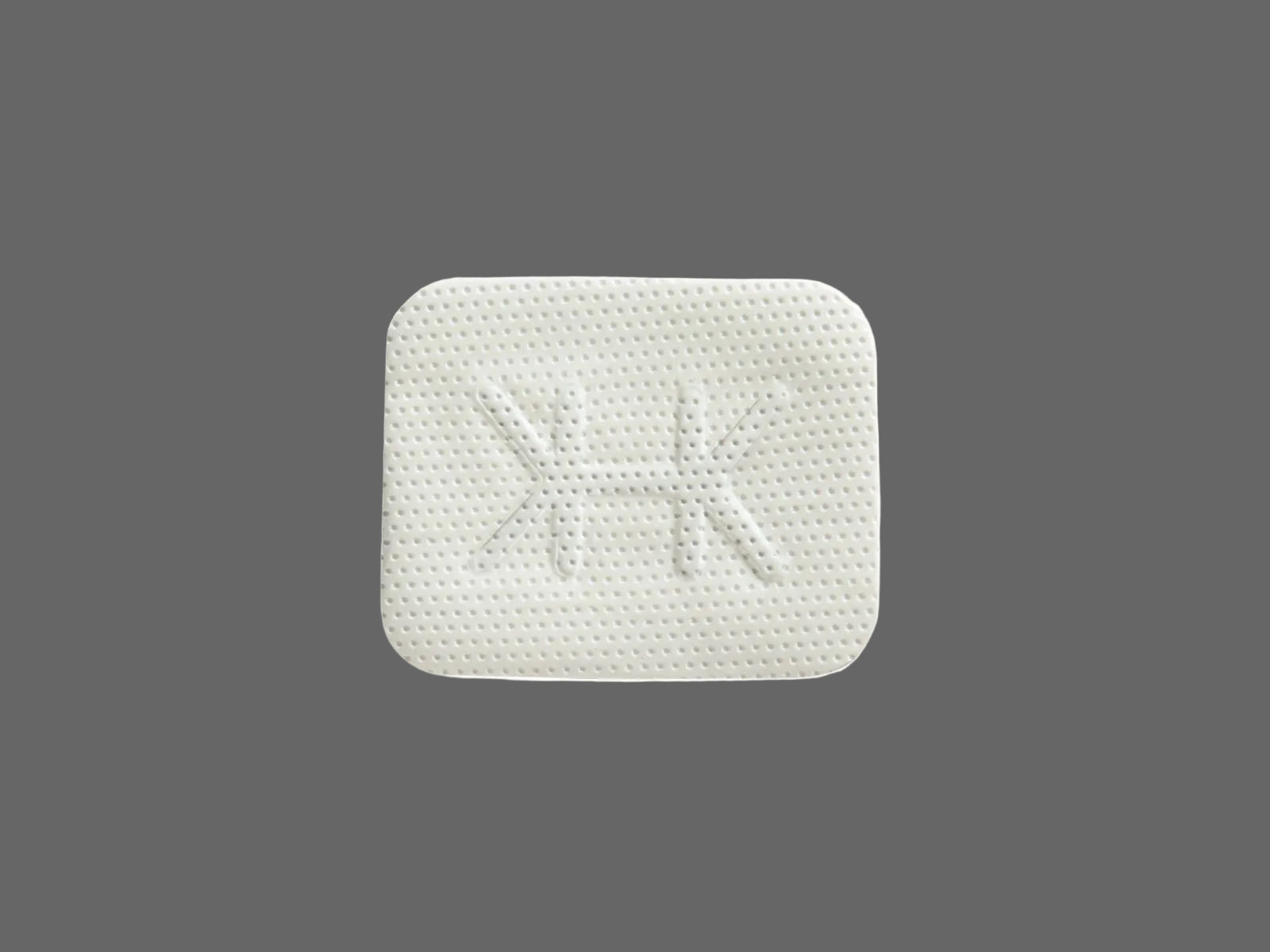 A rectangular white tablet with a textured surface and embossed mirrored Ks, inspired by the structure of Osteogenics Cytoplast™ Ti-150 Titanium-Reinforced PTFE Membrane (150 μm), set against a plain gray background.
