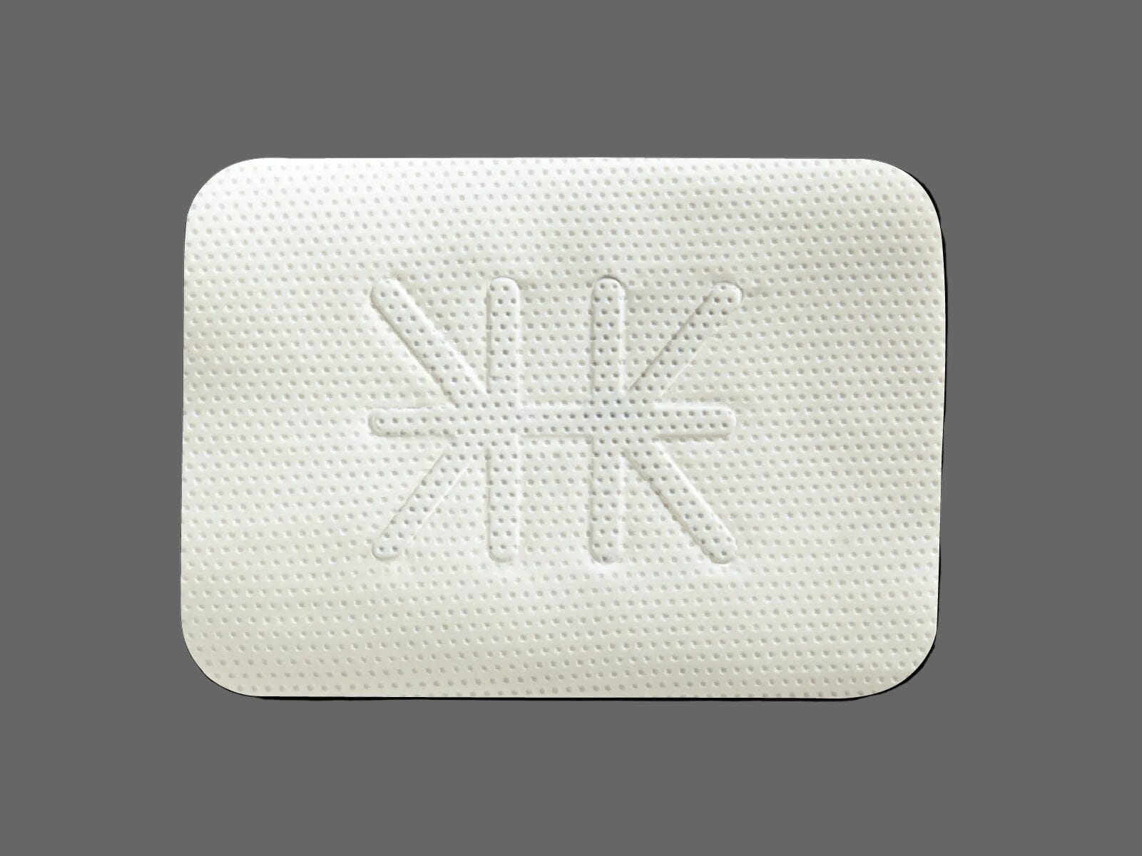 A rectangular white adhesive patch with a central geometric pattern resembles the Cytoplast™ Ti-250 Titanium-Reinforced PTFE Membrane (250 μm) by Osteogenics, designed for guided bone regeneration, shown on a gray background.