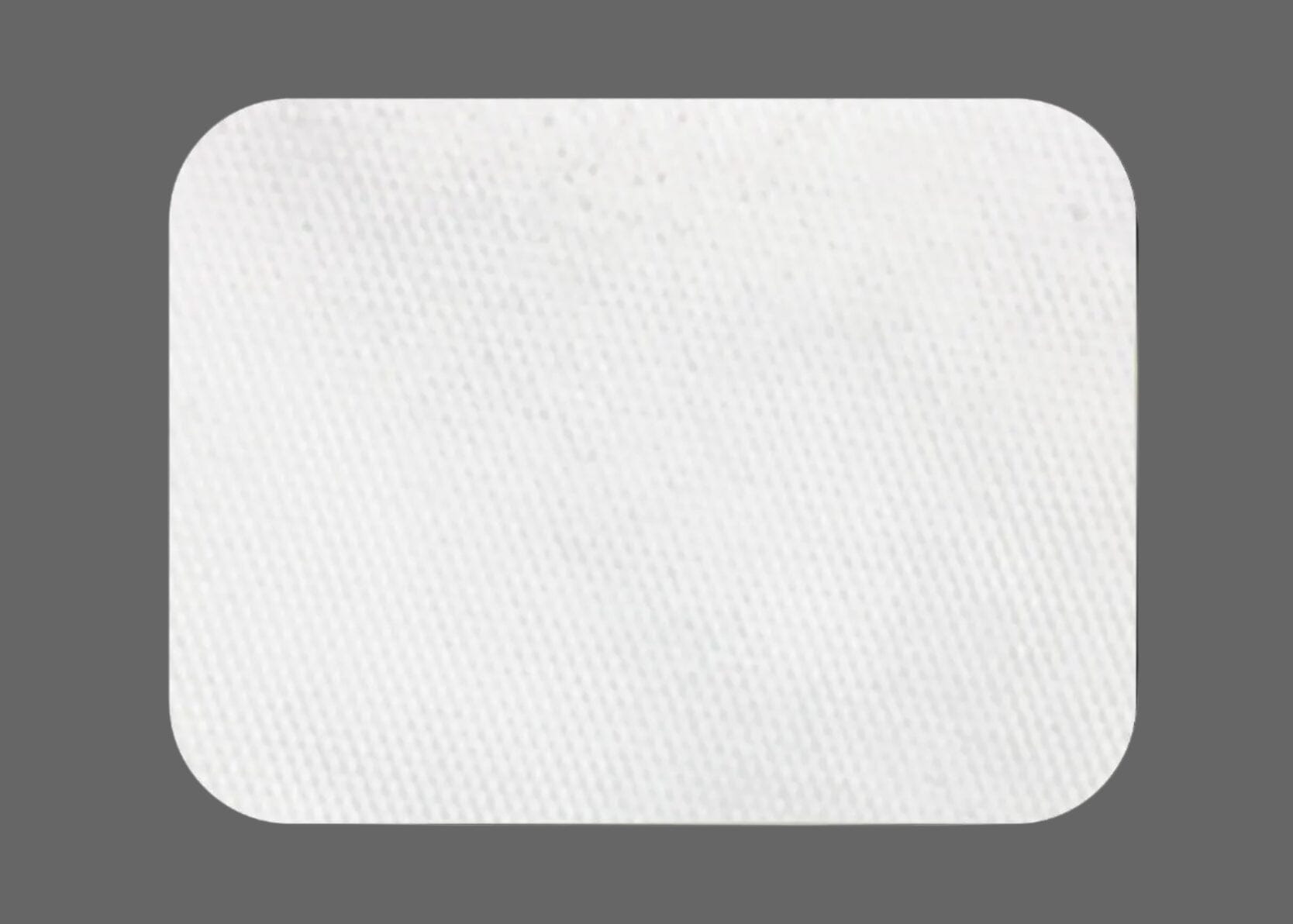 The ZMatrix™ Porcine Peritoneum Collagen Membrane by Osteogenics features a rectangular, white, textured surface with rounded corners, displayed against a solid gray background.