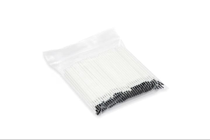 A clear bag of Reliance Cusp-Lok – 4" Bonding Brushes (250 Pack) by Reliance, featuring white cotton swabs with black tips—ideal for etchant application or as bonding brushes—shown on a white background.