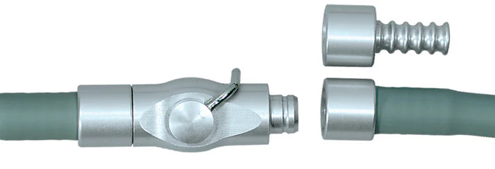 A close-up of the Quality Aspirators In-Line Cut-Off Valve (ILCOV) for surgical tubing, featuring its metal quick-disconnect coupling shown both assembled and disassembled against a white background.
