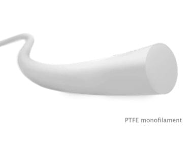 White PTFE monofilament magnified suture thread on a white background